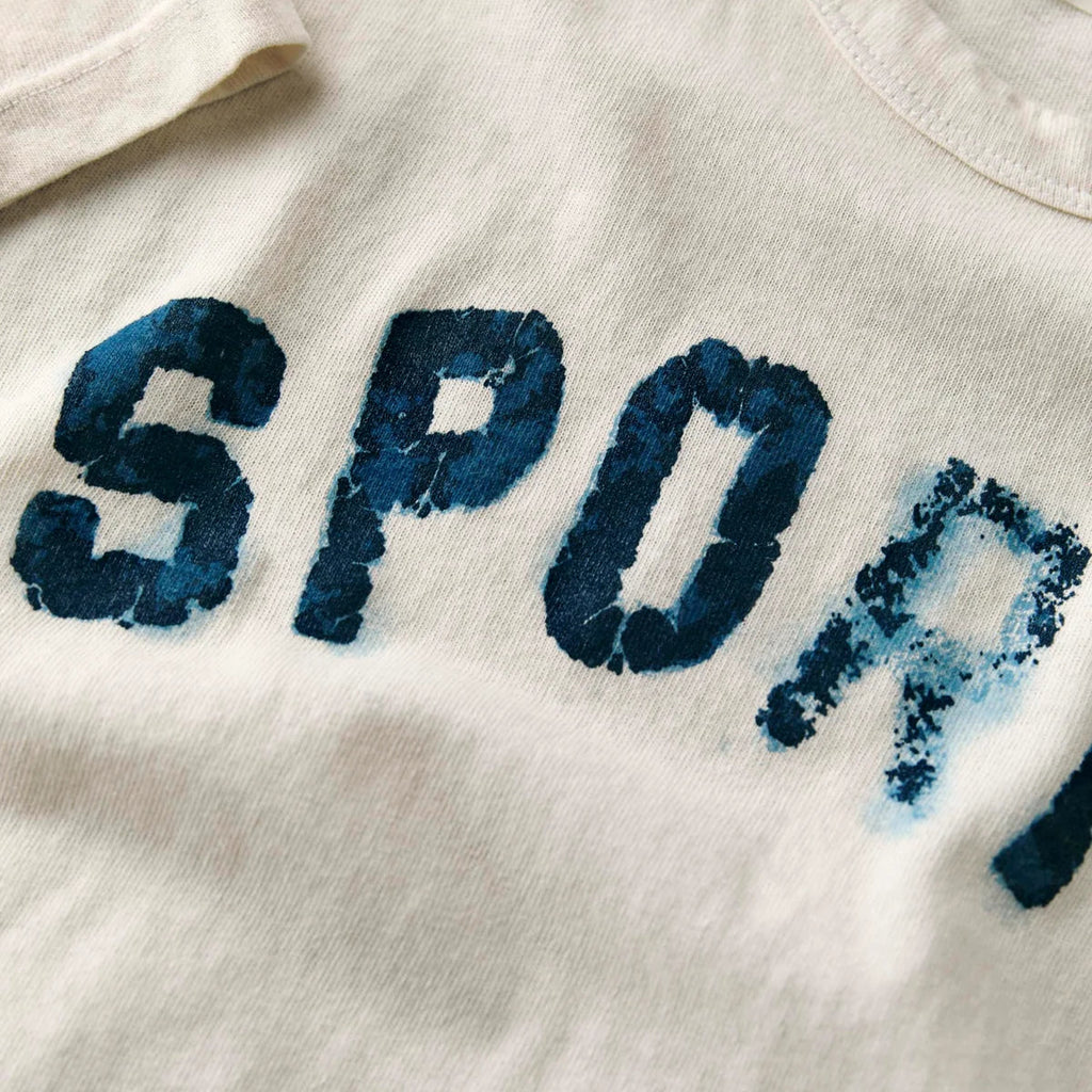 the "sports" tee